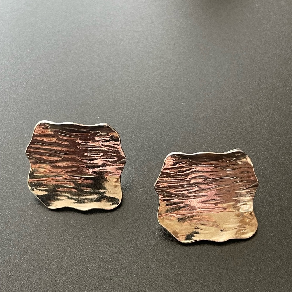 Textured silver tone pierced post earrings